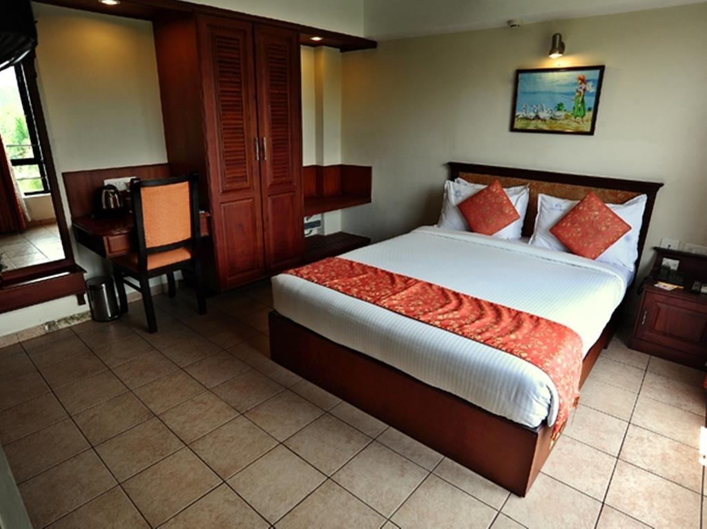 Hotel The Seven Hills Thiruvananthapuram Quarto foto